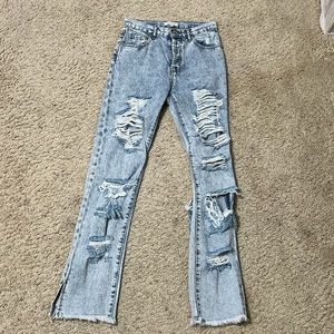 Light wash super distressed jeans